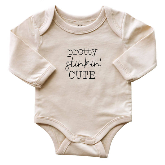 Pretty Stinkin' Cute Long Sleeve Graphic Bodysuit | Natural