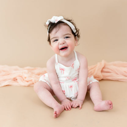 Spaghetti Strap Ruffle Romper in Bow