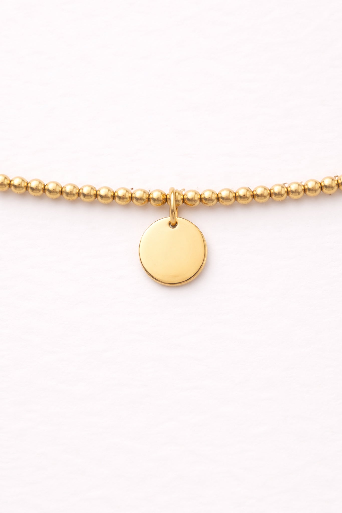 Engraved Circle Charm Beaded Bracelet