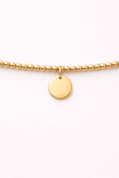 Engraved Circle Charm Beaded Bracelet