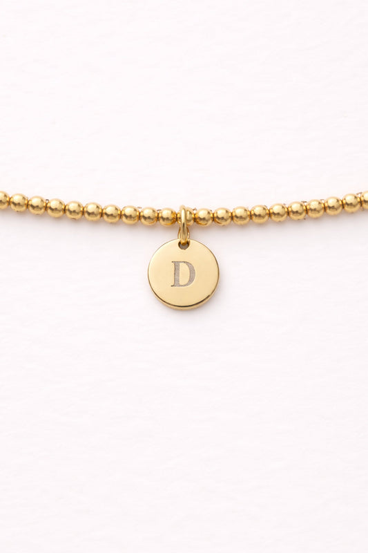 Engraved Circle Charm Beaded Bracelet