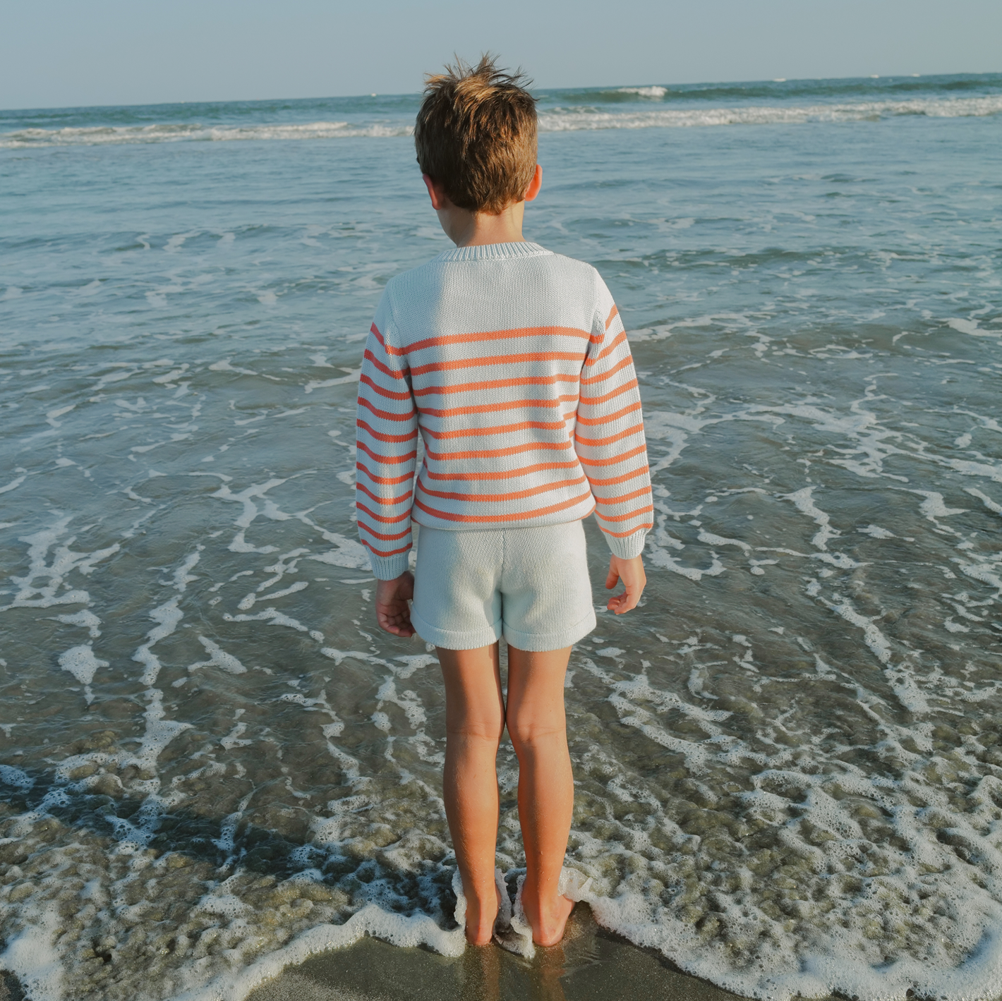 unisex light blue and peach stripe knit sweater