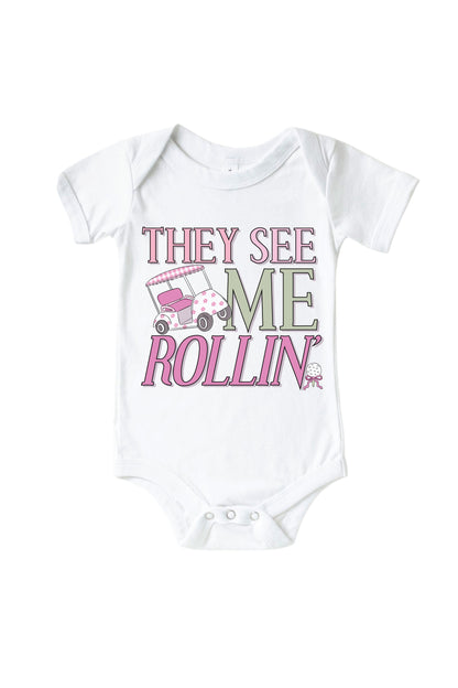 They See Me Rollin' Pink Graphic Bodysuit & Kids Tee | White